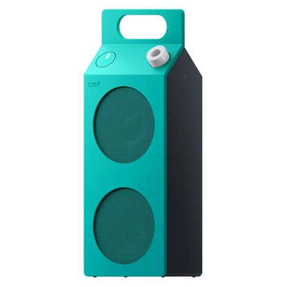 Nothing CMF Speaker M – bærbar Bluetooth-højttaler i turkis med to runde gitre, bærehåndtag og hvid lydstyrkeknap.