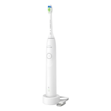 Hvid Philips Sonicare 5300 HX7108/01 sonisk elektrisk tandbørste med trykføler, tænd-knap, opladningsstation og USB-kabel.