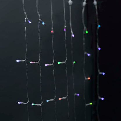 Nedis SmartLife LED Gardin lyskæde RGB 180 LED 3 m detaljeret med små flerfarvede lys mod mørk baggrund.